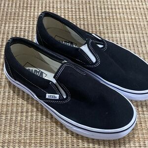 Vans Black and White Classic Slip-On Sneakers